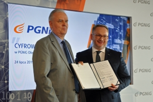 Paweł Piwowar, wiceprezes Asseco Poland i Henryk Mucha, prezes PGNiG OD